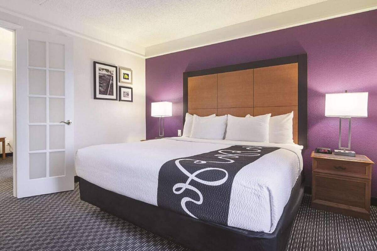 Premium bedding, desk, blackout drapes, iron/ironing board