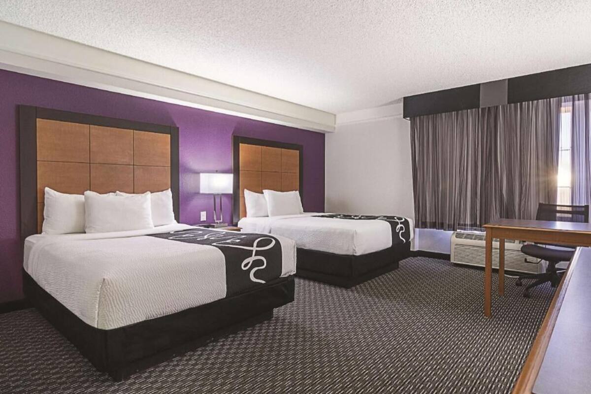 Premium bedding, desk, blackout drapes, iron/ironing board
