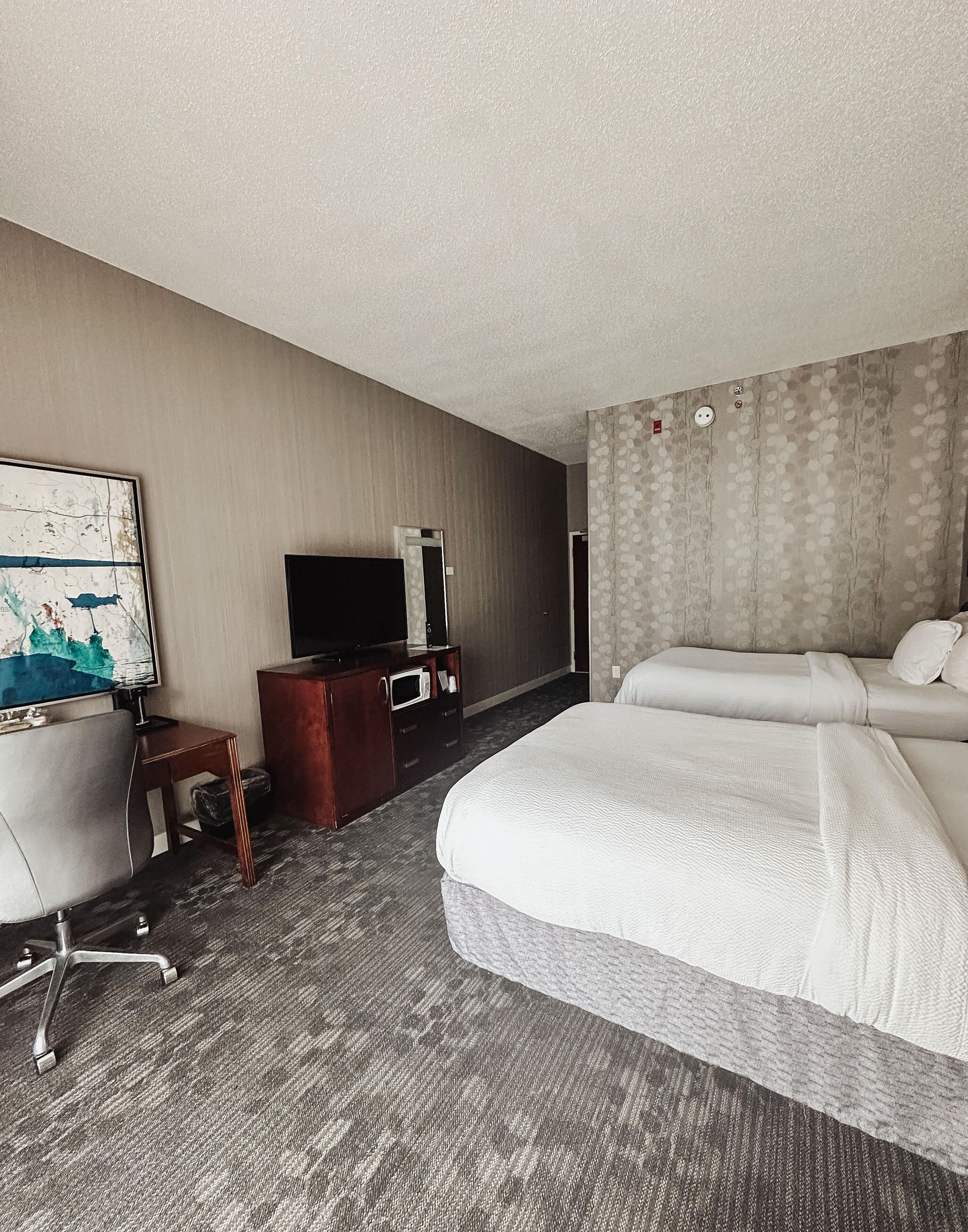 premium bedding, down duvets, desk, laptop workspace