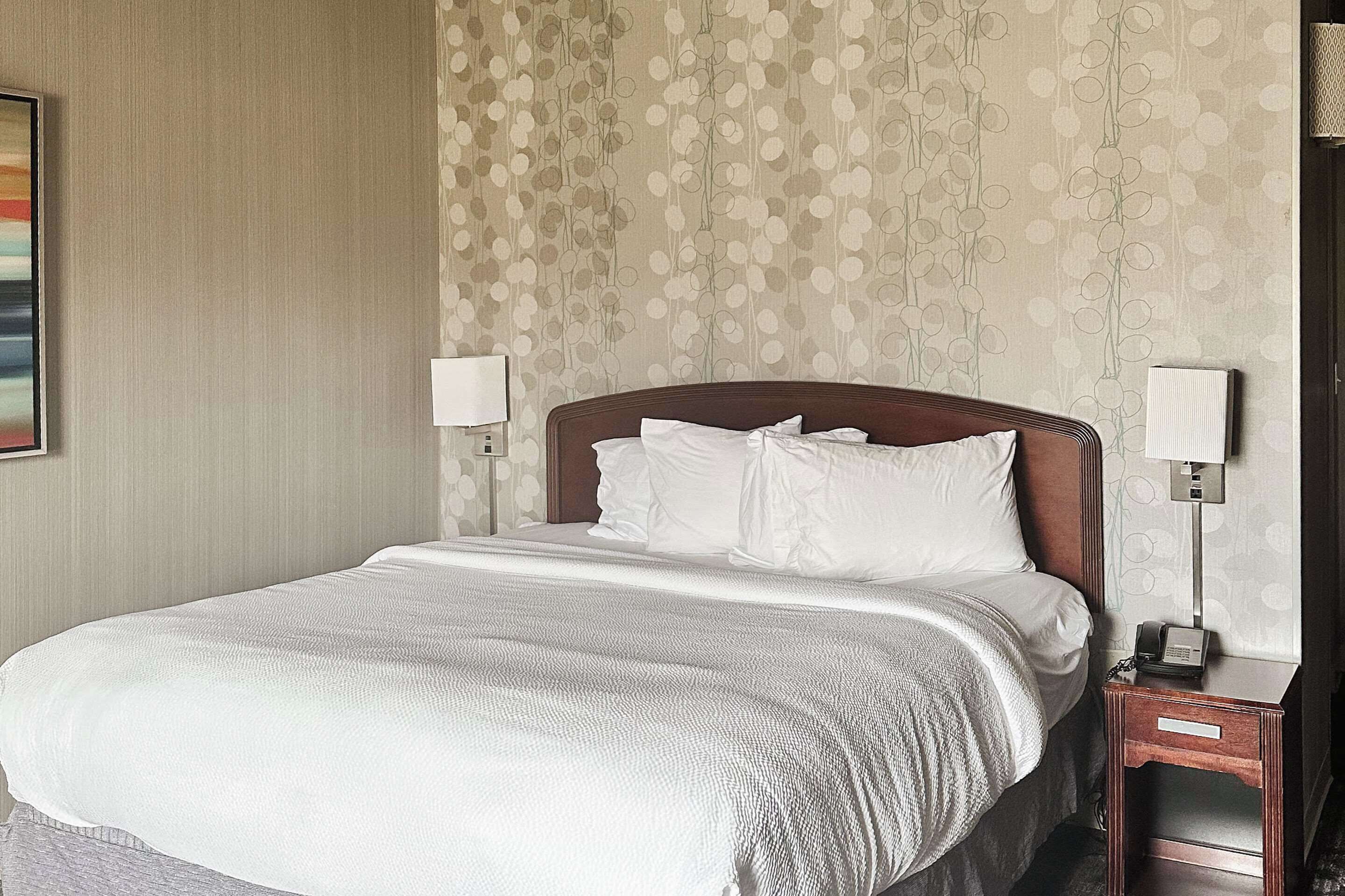 premium bedding, down duvets, desk, laptop workspace