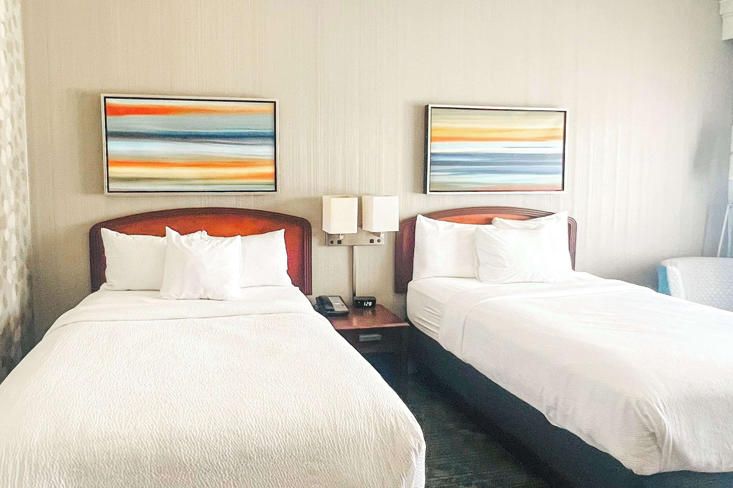 premium bedding, down duvets, desk, laptop workspace