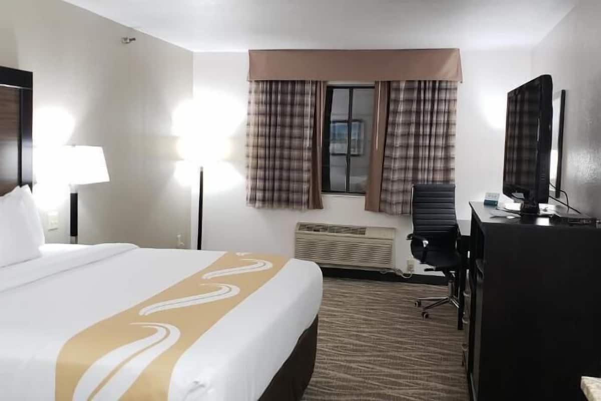 Blackout drapes, iron/ironing board, free cribs/infant beds