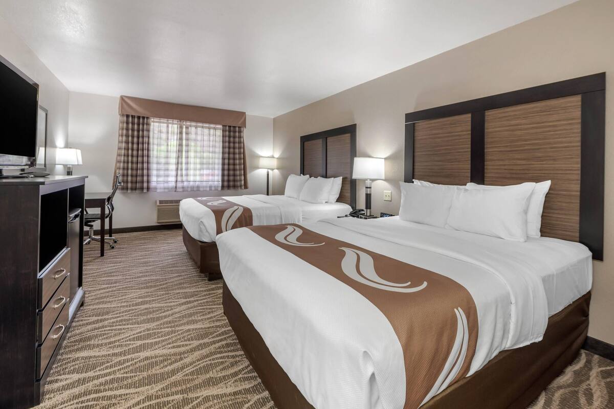 Standard Room, 2 Queen Beds, Non Smoking | Blackout drapes, iron/ironing board, cribs (free)