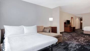 Suite, 1 très grand lit et 1 canapé-lit | Couette en duvet d'oie, coffres-forts dans les chambres, bureau