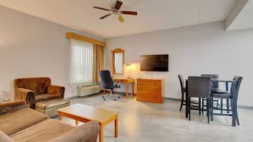 Suite, Non Smoking (2 Queen Beds, 2 person Sofabed) | Living area | Plasma TV