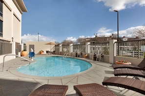 Outdoor pool, open 8:00 AM to 10 PM, pool loungers