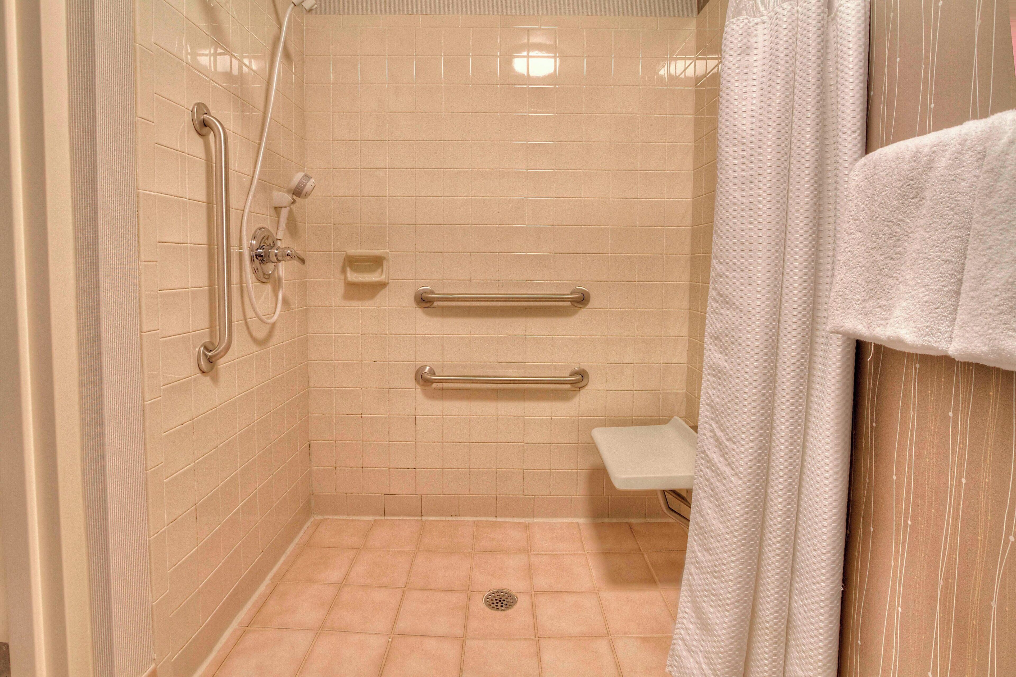 combined shower/bathtub, free toiletries, hair dryer, towels