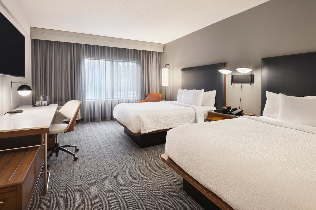 Premium bedding, down comforters, memory foam beds, desk