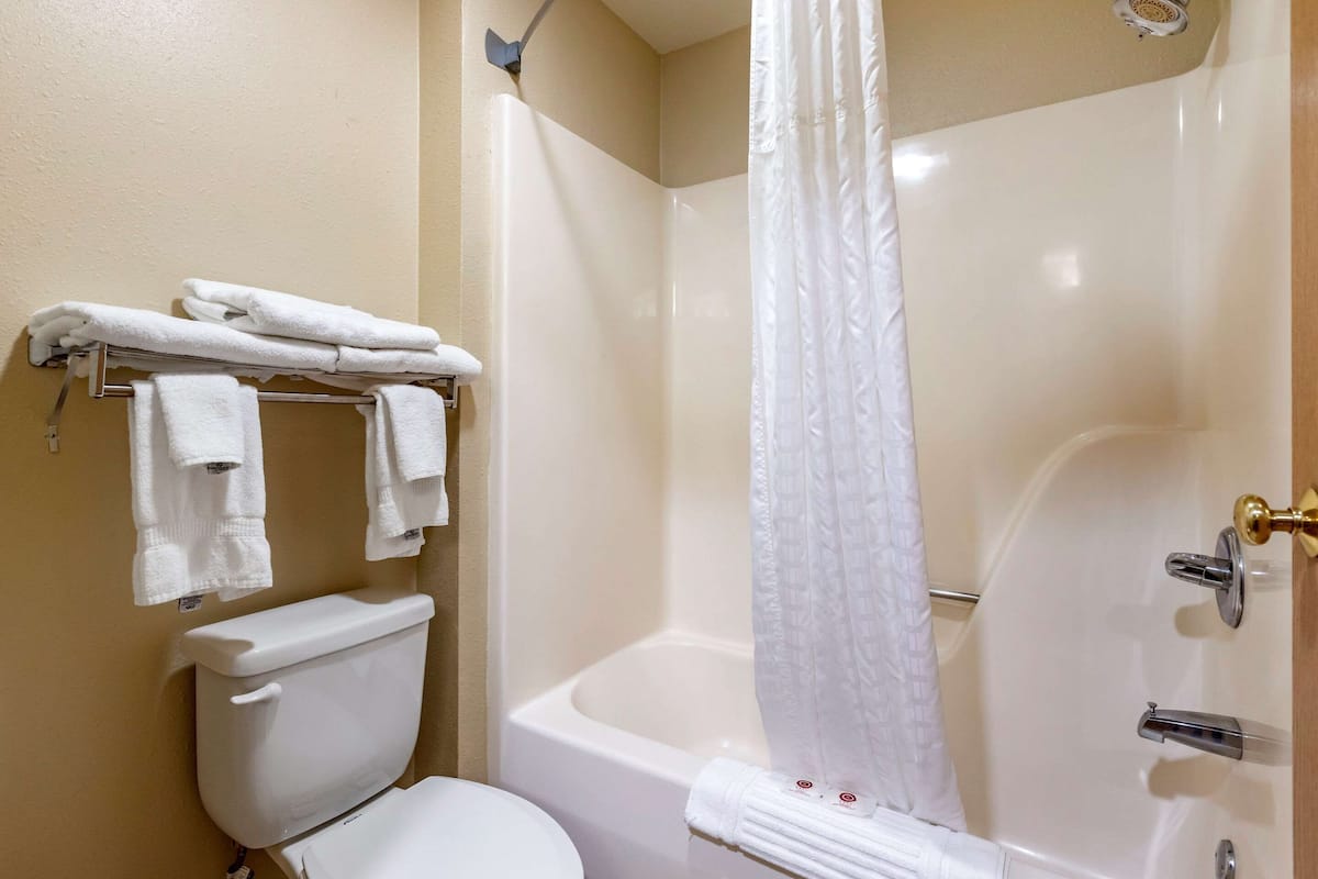 premium bedding, pillow-top beds, desk, blackout curtains
