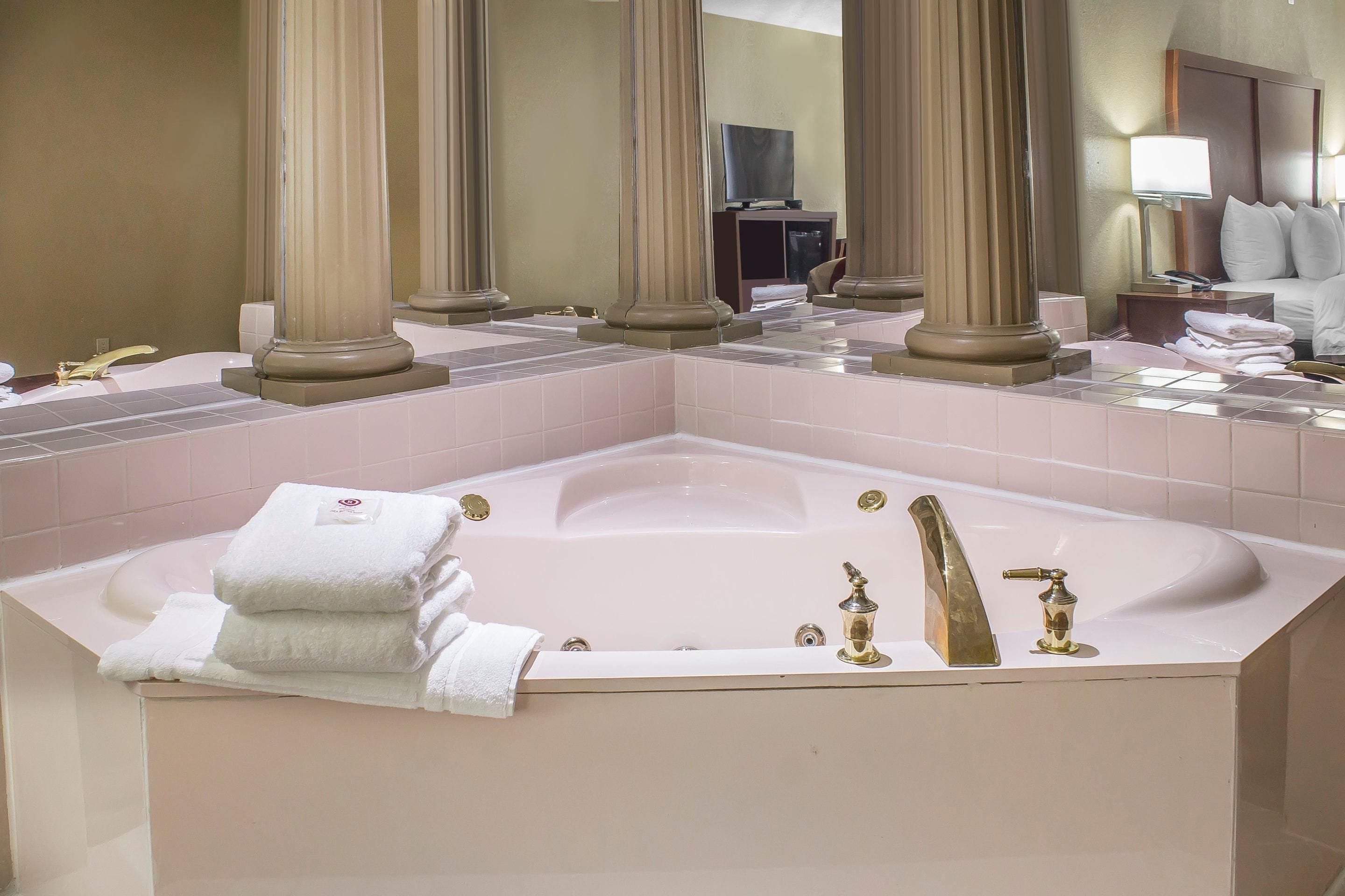 premium bedding, pillow-top beds, desk, blackout curtains