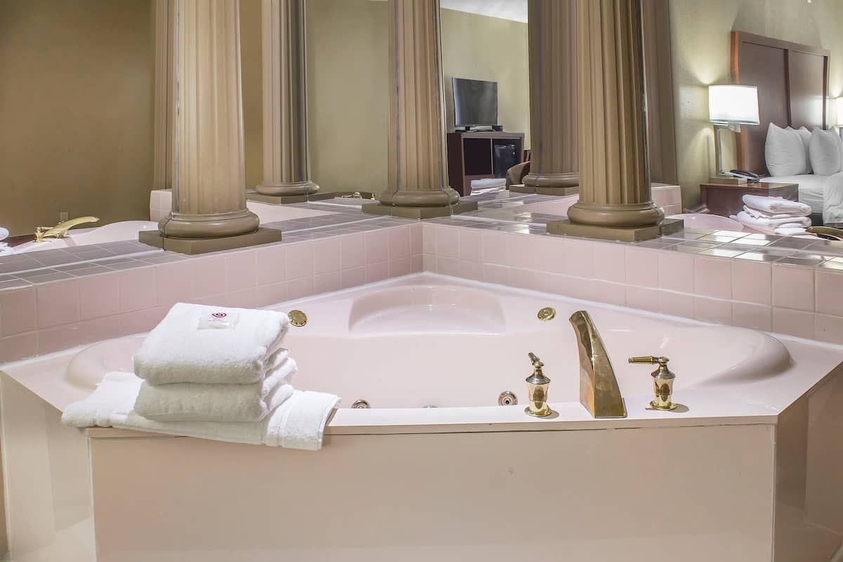 premium bedding, pillow-top beds, desk, blackout curtains