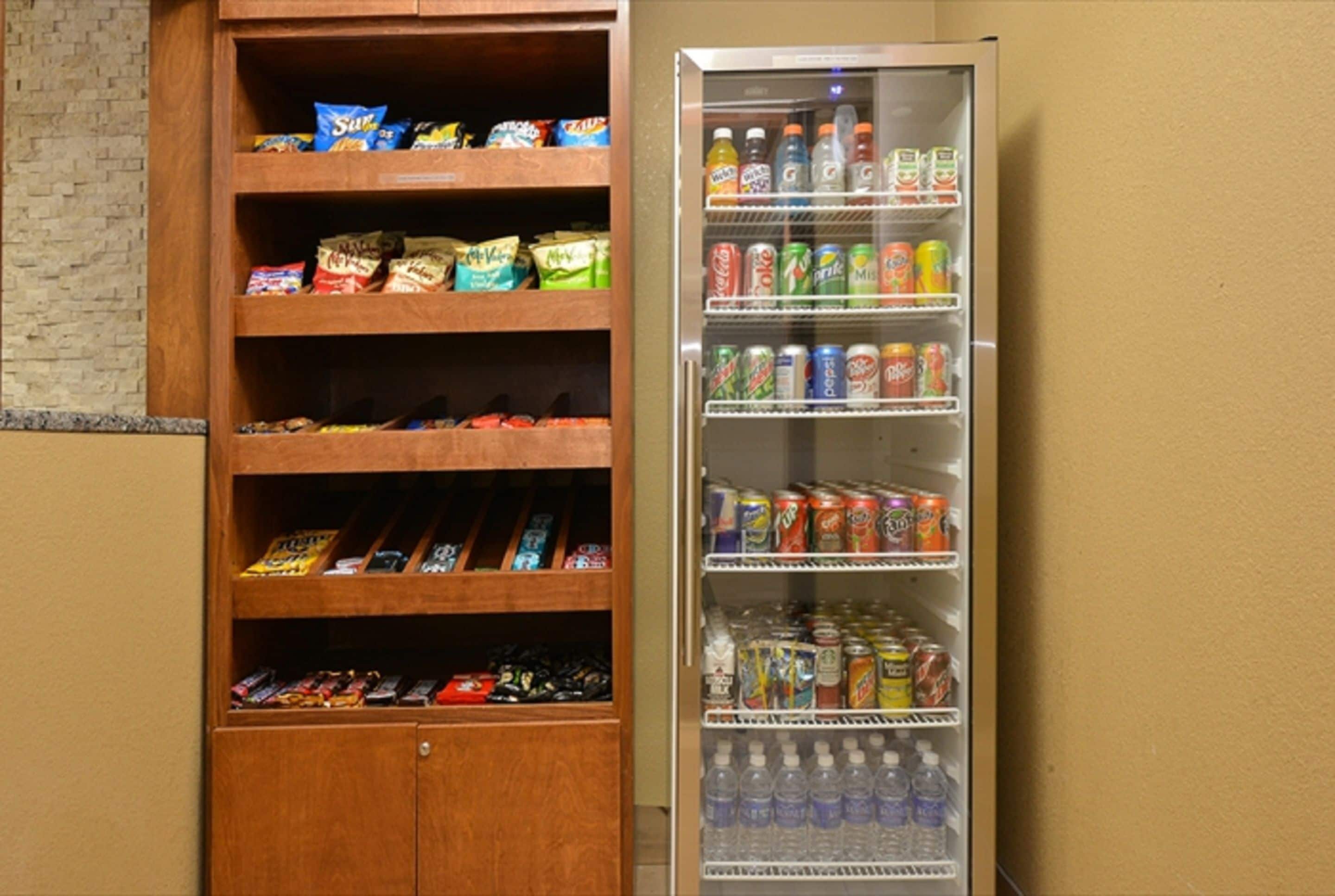 A vending machine stocked with snacks and beverages.