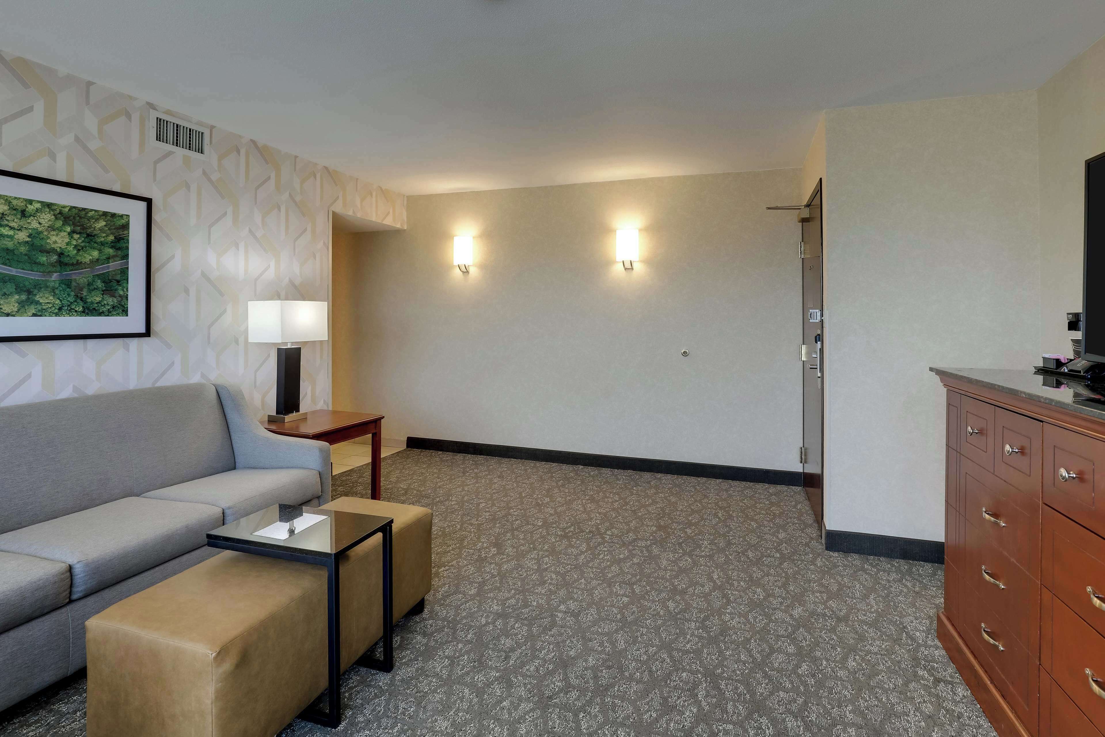 desk, blackout curtains, iron/ironing board, free cots/infant beds