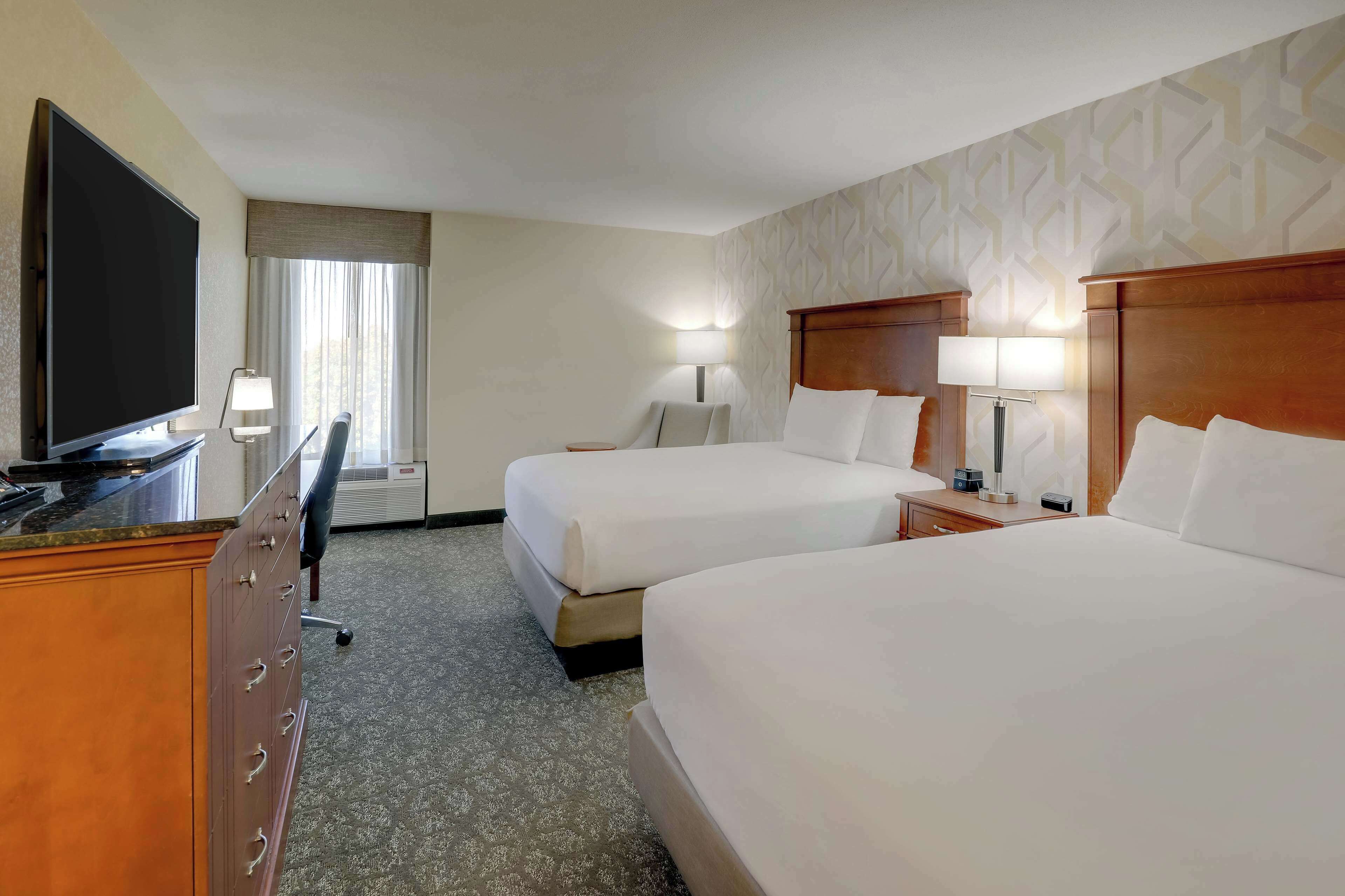 desk, blackout curtains, iron/ironing board, free cots/infant beds