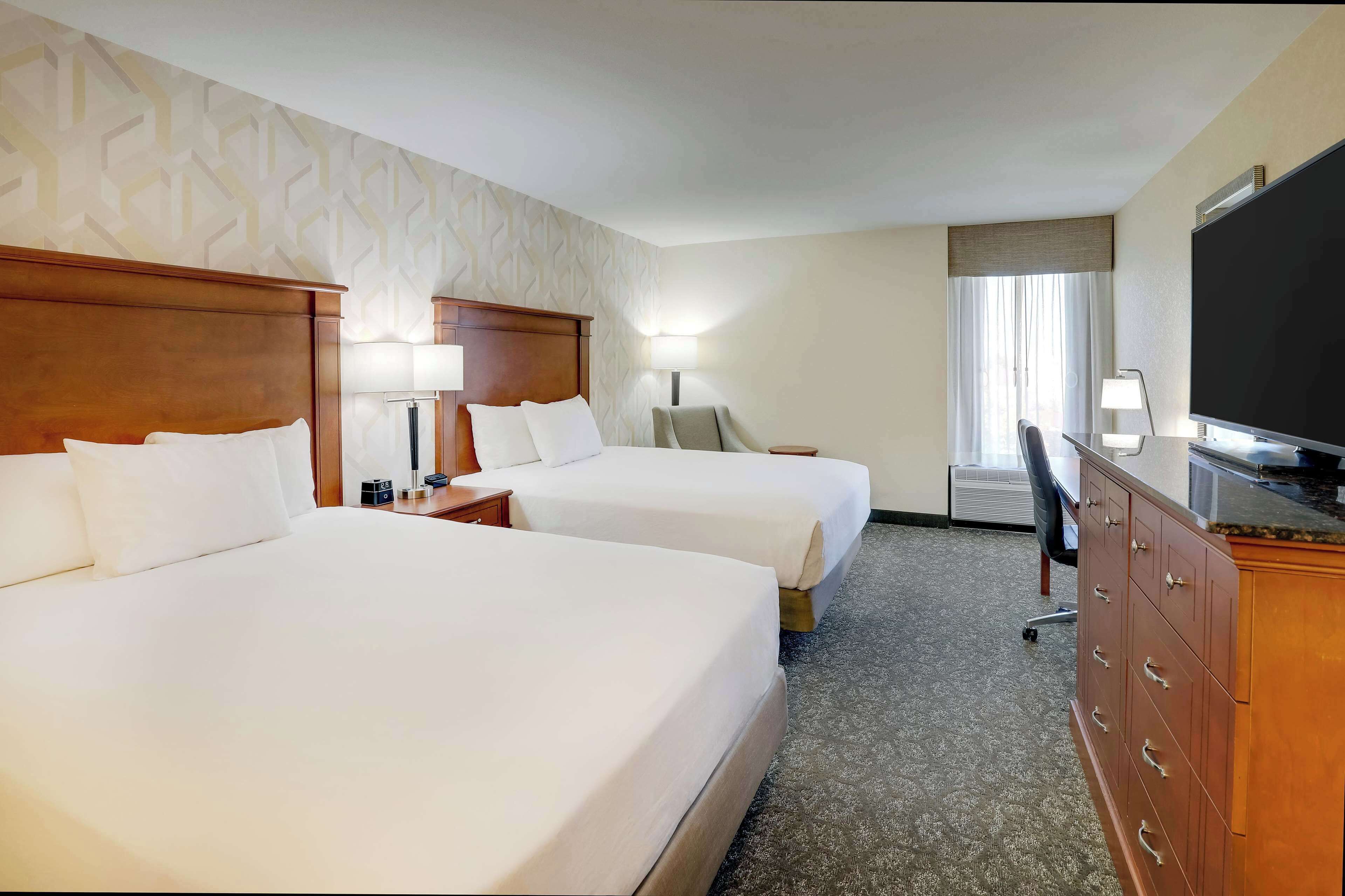 desk, blackout curtains, iron/ironing board, free cots/infant beds