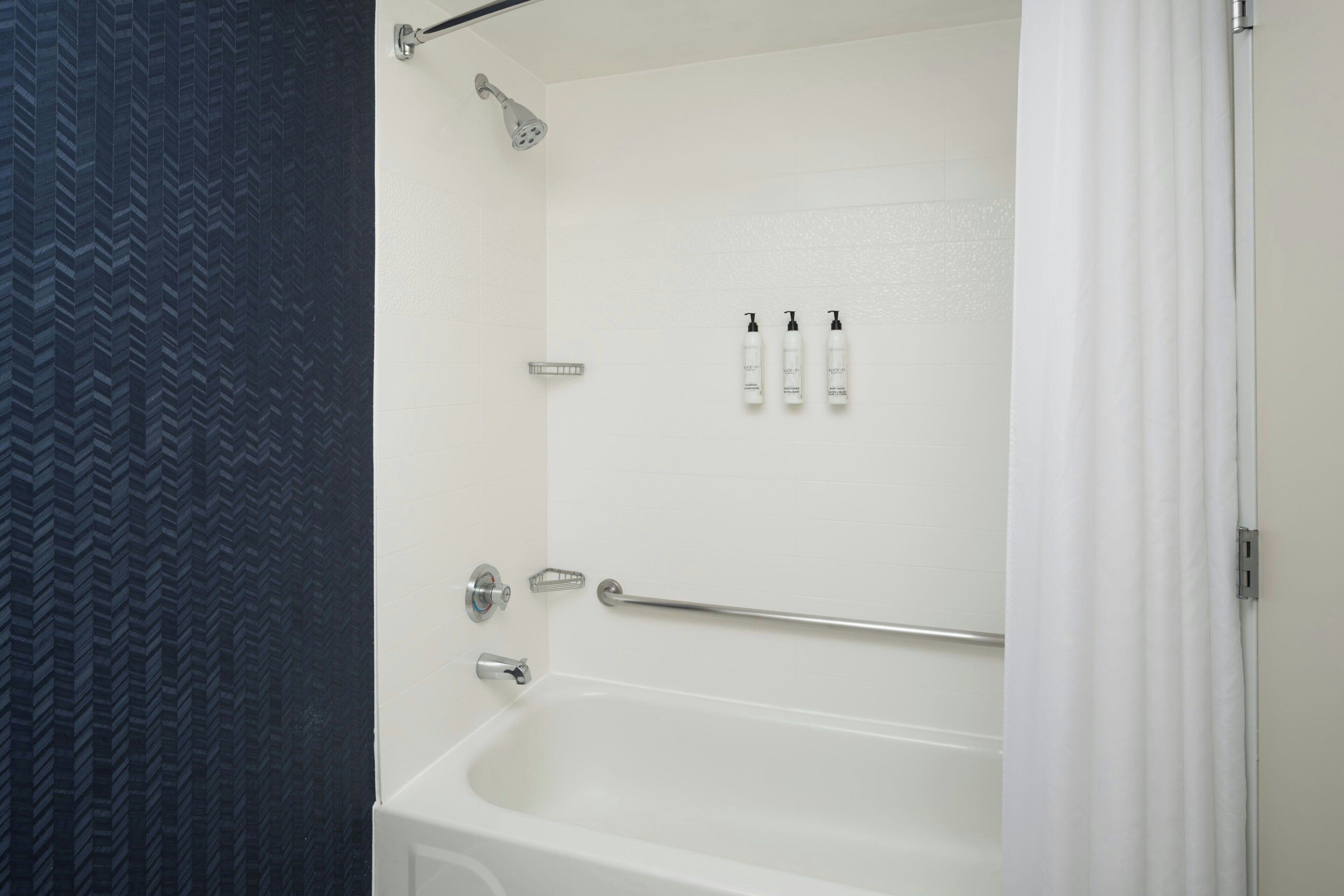 combined shower/bathtub, free toiletries, hair dryer, towels