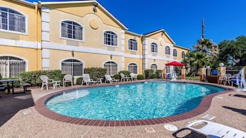 Seasonal outdoor pool, open 10:00 AM to 10:00 PM, pool loungers