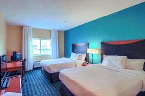 Hypo-allergenic bedding, desk, laptop workspace, blackout curtains