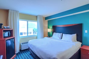 Suite, 1 King Bed, Non Smoking | Hypo-allergenic bedding, desk, laptop workspace, blackout drapes