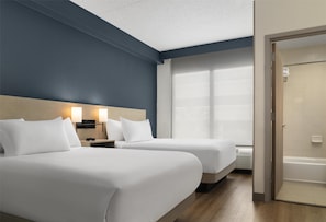 Premium bedding, down duvets, in-room safe, desk