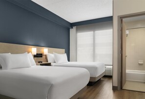 Premium bedding, down duvets, in-room safe, desk