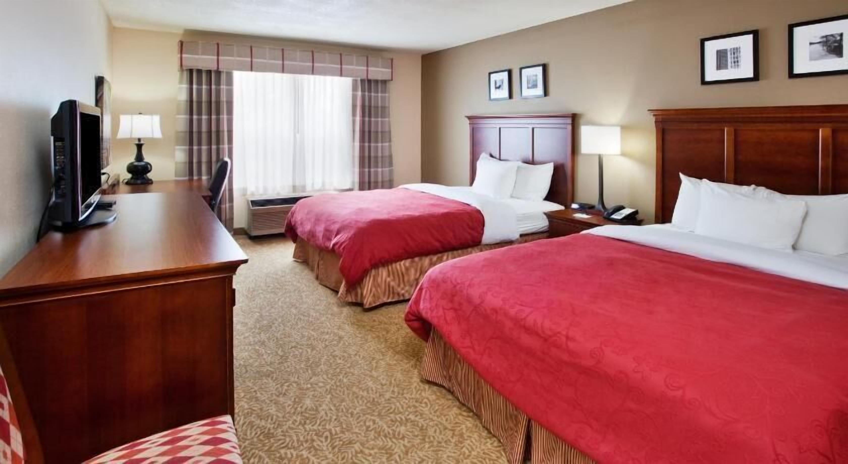 Premium bedding, down comforters, pillowtop beds, desk