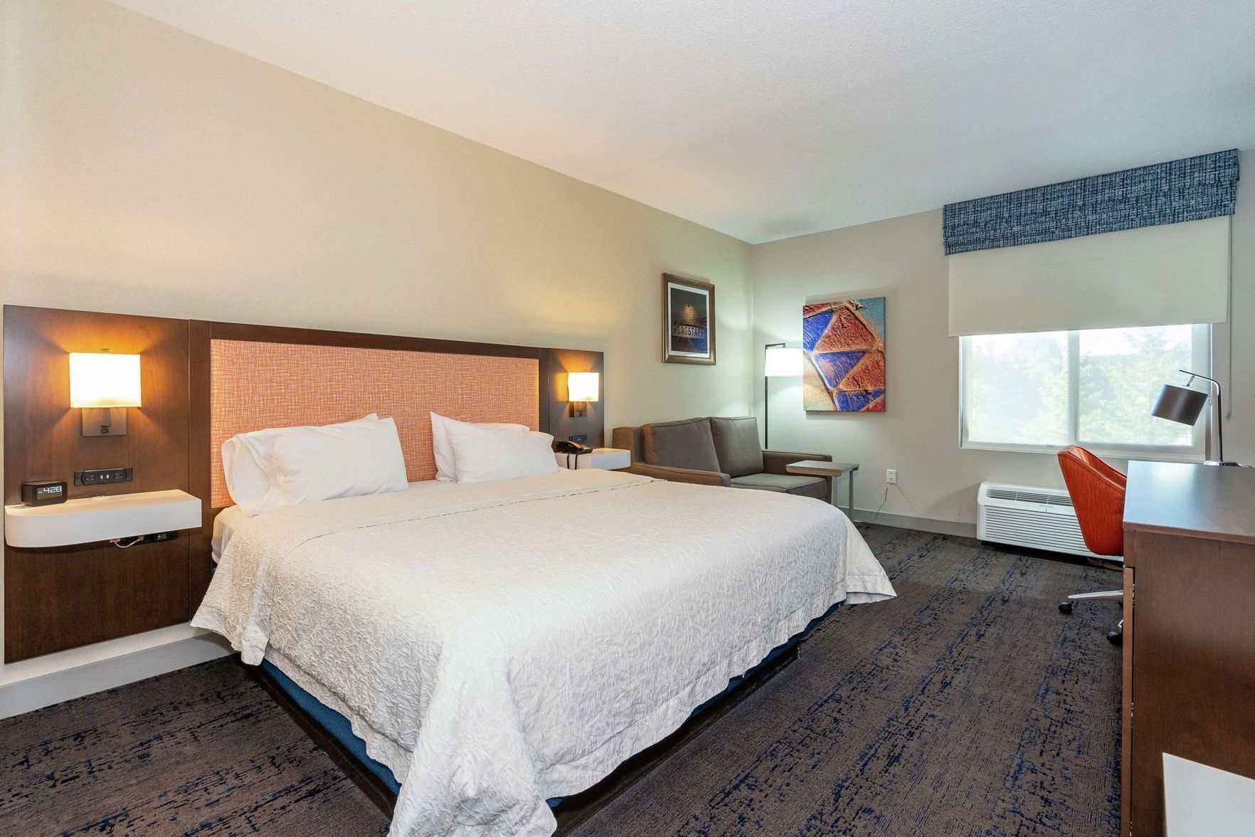 Premium bedding, blackout curtains, iron/ironing board