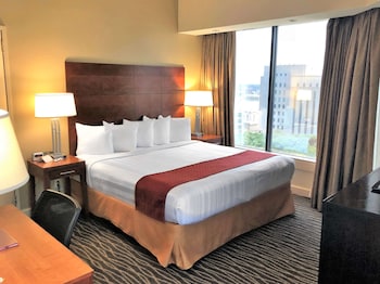 Pillowtop beds, in-room safe, desk, laptop workspace at Blake Hotel New Orleans, BW Signature Collection