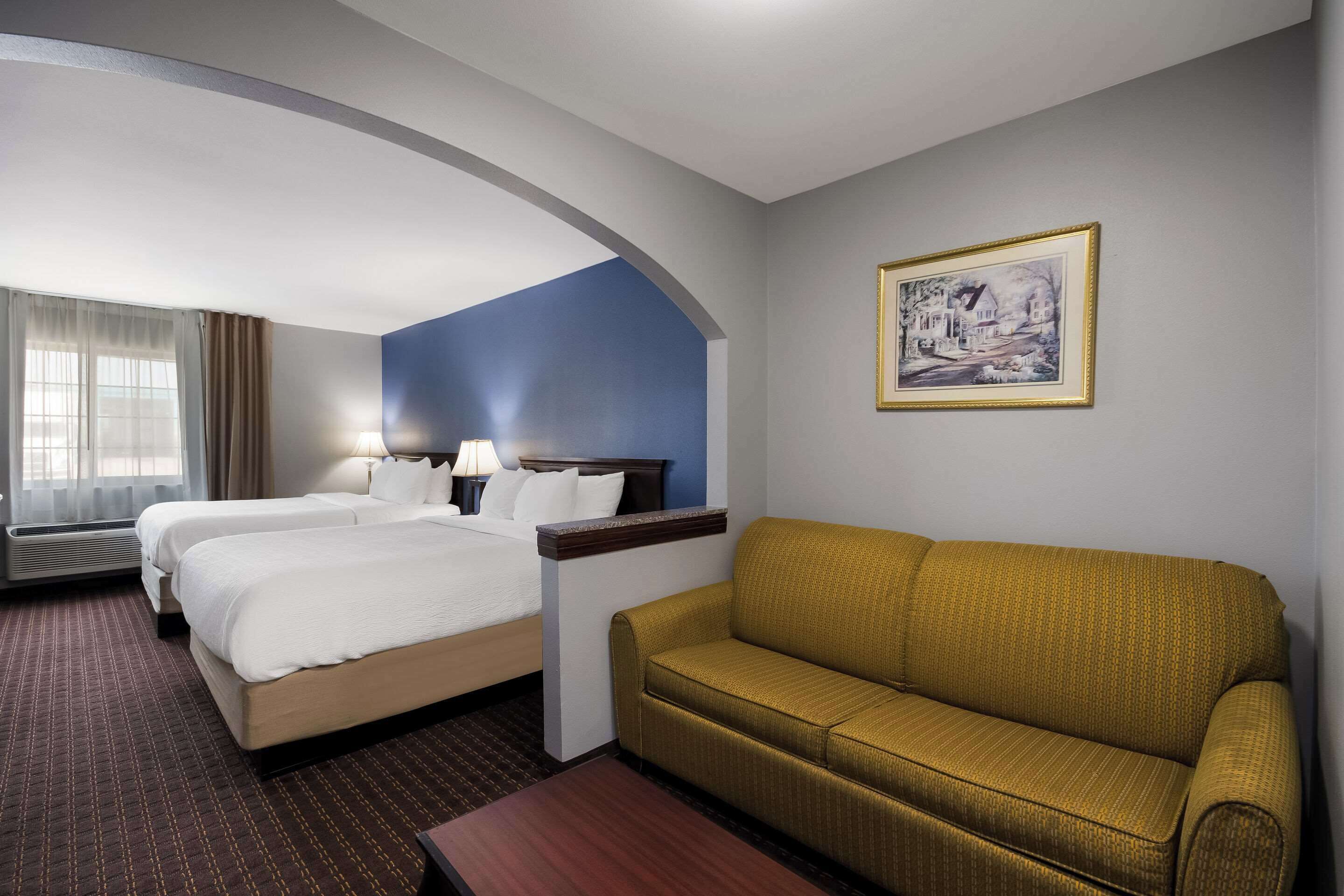 Suite, Multiple Beds, Non Smoking | Pillow-top beds, desk, laptop workspace, iron/ironing board