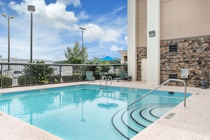 Outdoor pool, pool umbrellas, sun loungers