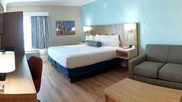 King room with Twin Sofa bed | Pillow-top beds, in-room safe, desk, laptop workspace