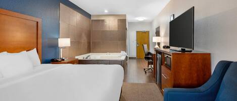 Escritorio, tabla de planchar con plancha, wifi gratis y ropa de cama