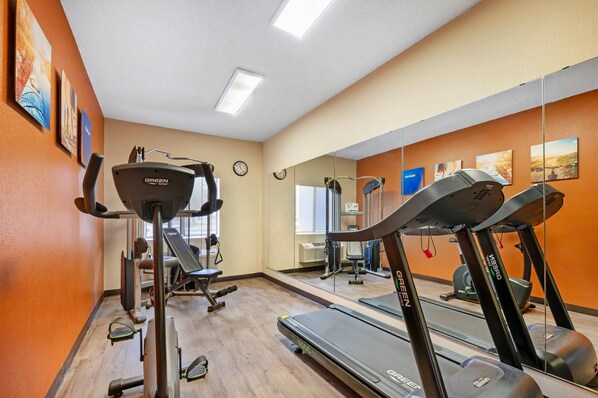 A gym with treadmills, exercise bikes, and weight machines. - Comfort Inn & Suites North Greenfield (Greenfield)