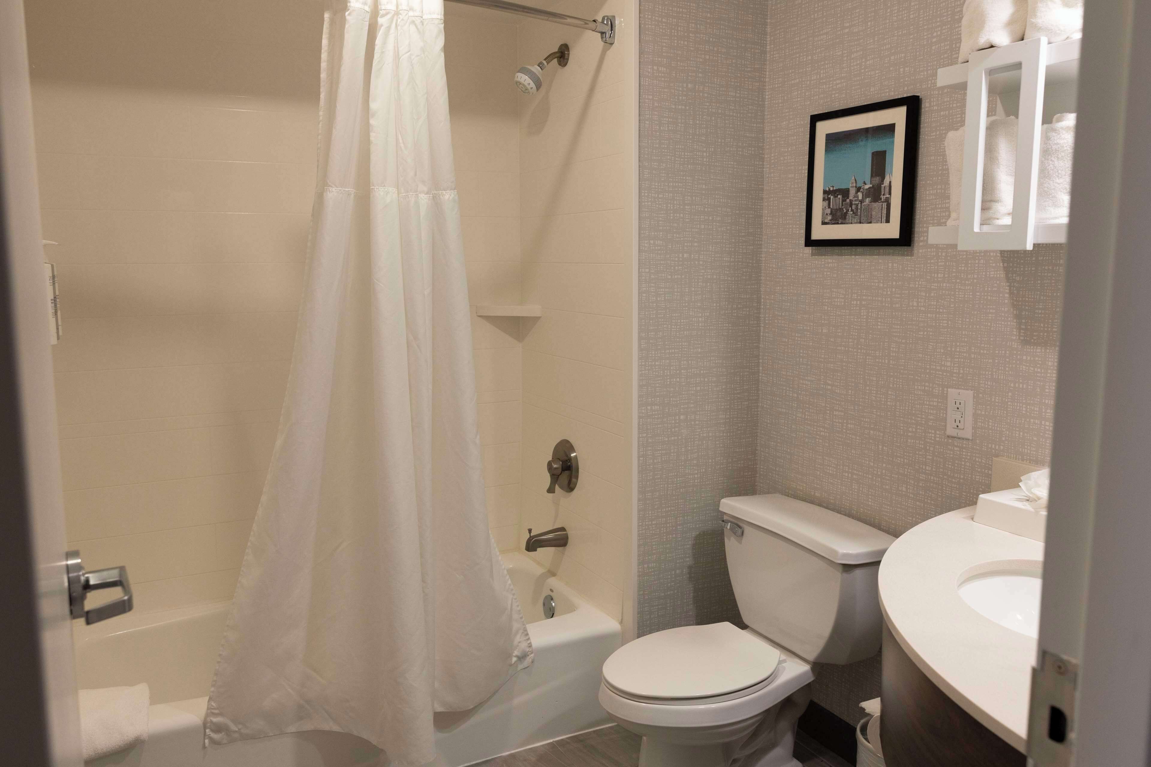 two double beds accessible | bathroom | rainfall showerhead, designer toiletries, hair dryer, towels