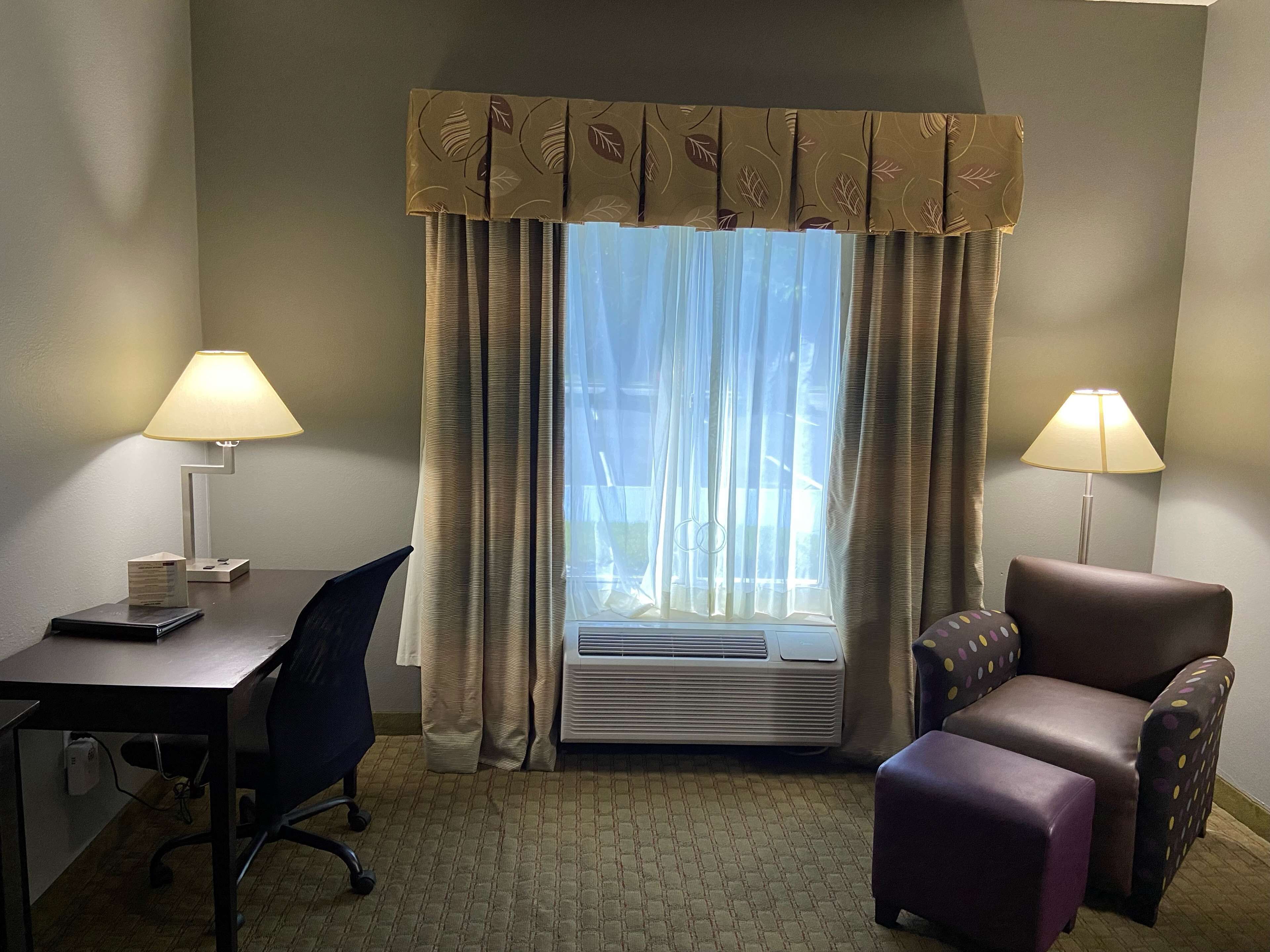 hypo-allergenic bedding, pillow-top beds, desk, laptop workspace