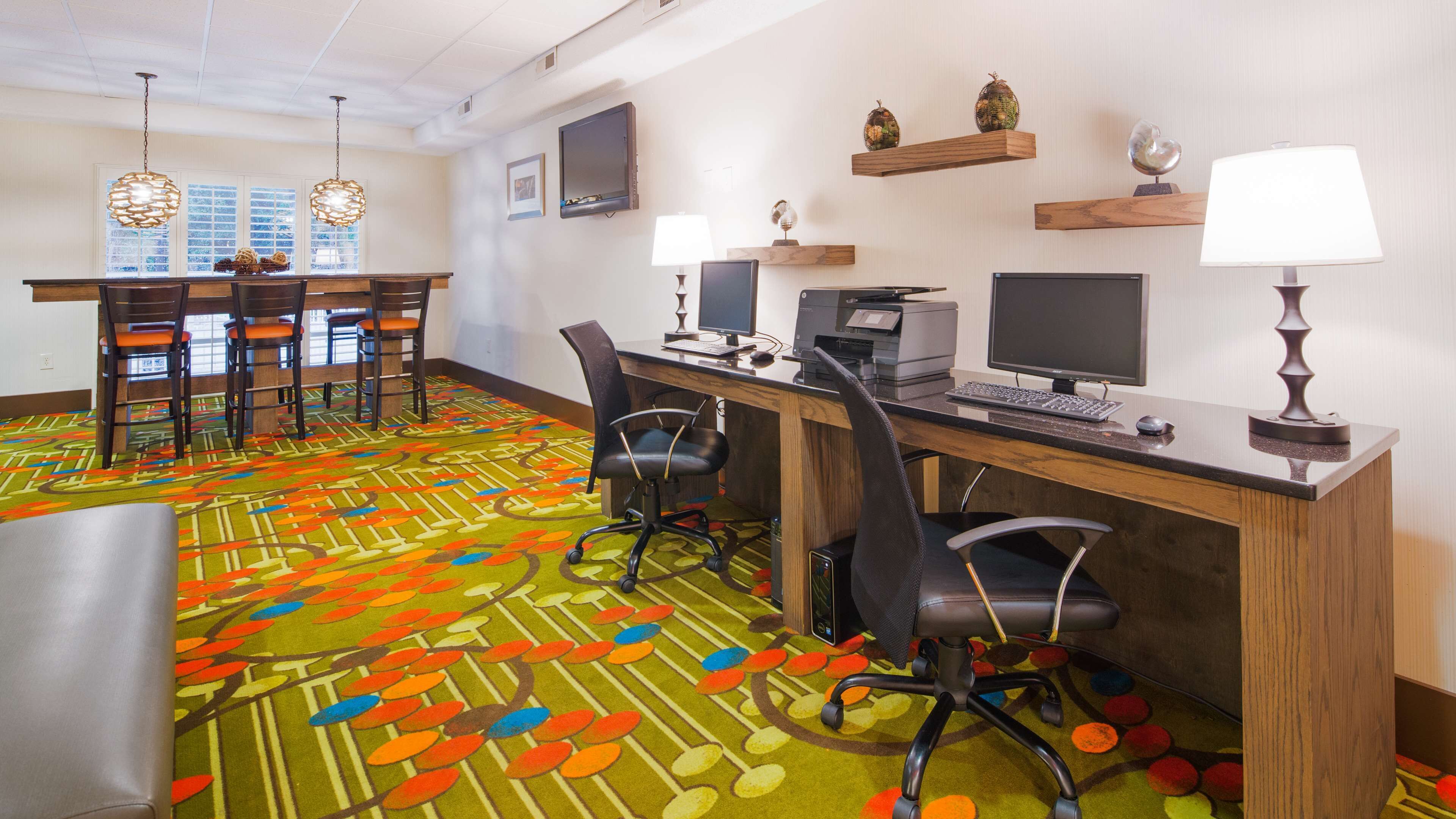 hypo-allergenic bedding, pillow-top beds, desk, laptop workspace