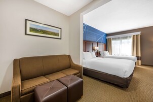 Suite, 2 Queen Beds, Non Smoking | Blackout drapes, iron/ironing board, free cribs/infant beds, free WiFi