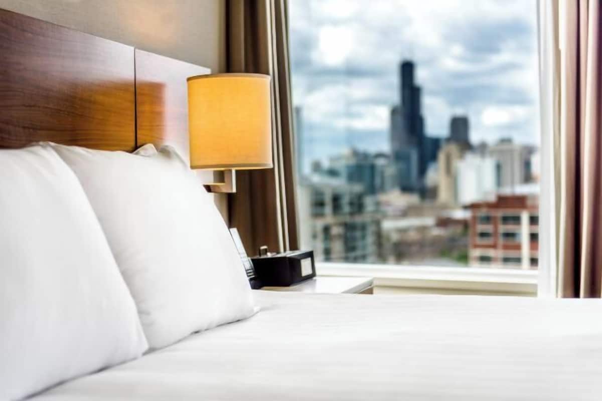 Premium bedding, down comforters, pillowtop beds, in-room safe