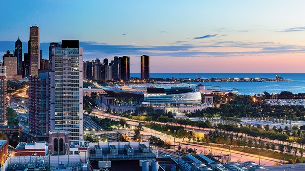A cityscape with high-rise buildings, a marina, and a waterfront. - Hyatt Regency McCormick Place Chicago    (Chicago)