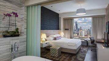 Premium bedding, down comforters, pillowtop beds, in-room safe