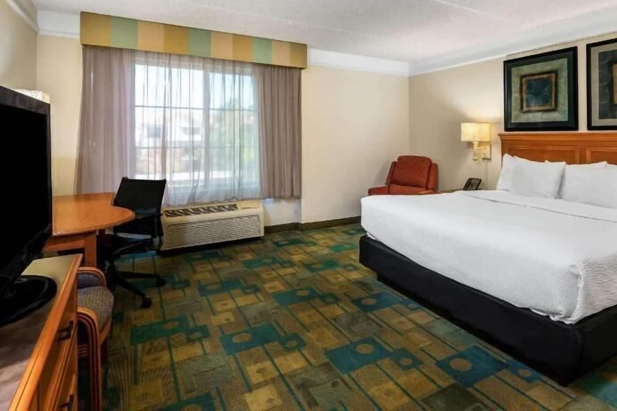 Premium bedding, desk, blackout drapes, iron/ironing board
