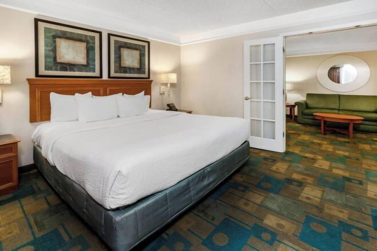 Premium bedding, desk, blackout drapes, iron/ironing board