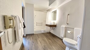 Studio Suite, 1 Bedroom | Bathroom | Combined shower/bathtub, free toiletries, hair dryer, towels