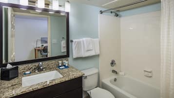 Designer toiletries, hair dryer, towels