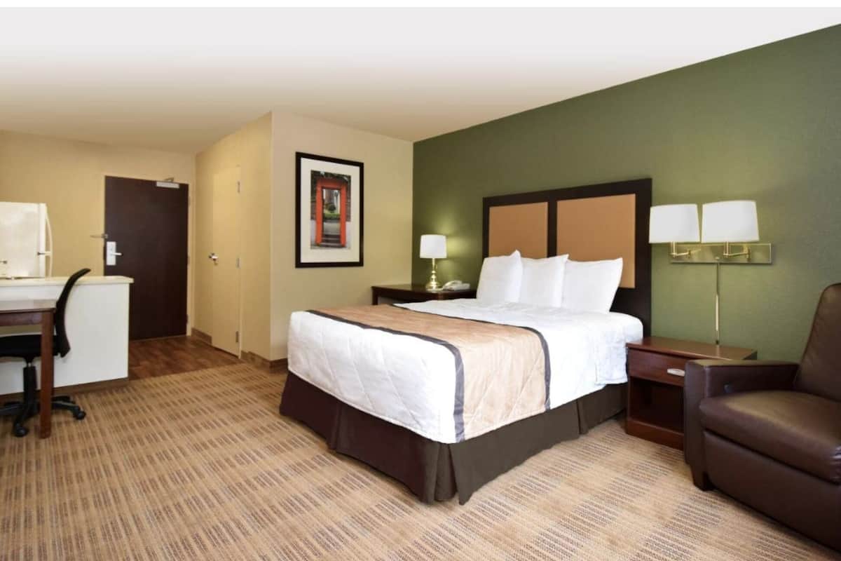 In-room safe, desk, laptop workspace, iron/ironing board