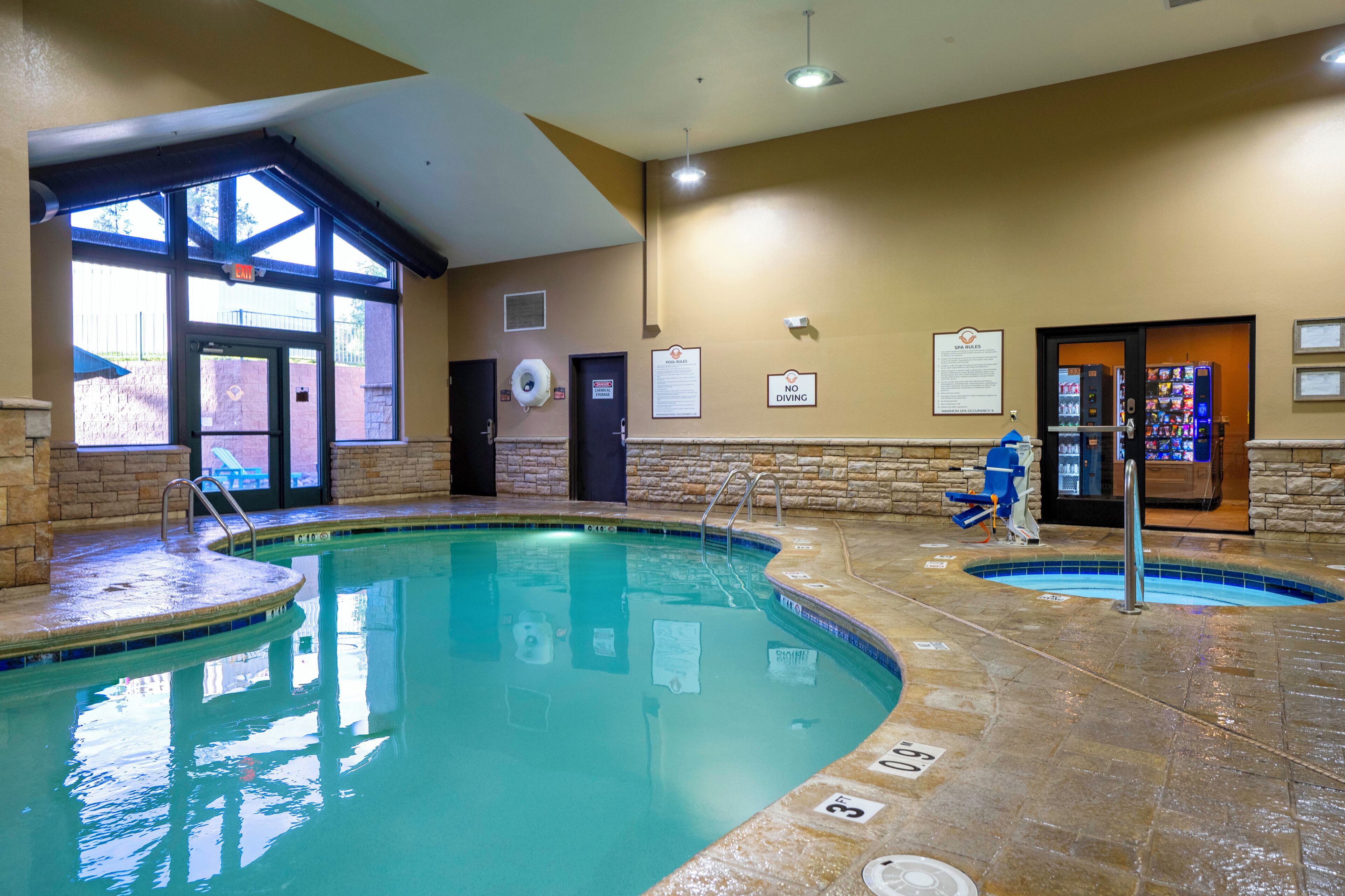 Indoor pool, pool umbrellas, sun loungers