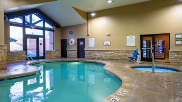 Indoor pool, pool umbrellas, sun loungers