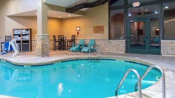 Indoor pool, pool umbrellas, sun loungers