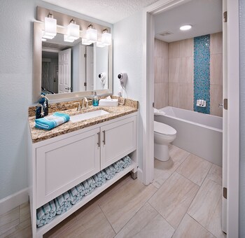 2 Bedroom Street View | Bathroom | Shower, hair dryer, towels at Grand Seas by Exploria Resorts