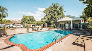 Outdoor pool, open 9:00 AM to 9:00 PM, pool umbrellas, sun loungers